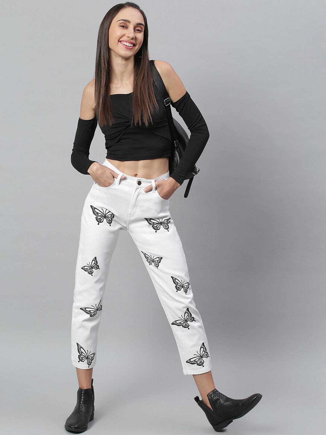 Kotty Women White Regular Fit Mid-Rise Clean Look Printed Stretchable Jeans