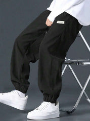 Kotty Men Relaxed High-Rise Corduroy Joggers Trousers