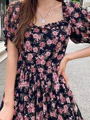 Kotty Black & Pink Floral Printed Sweetheart Neck Puff Sleeves Crepe Fit & Flare Dress