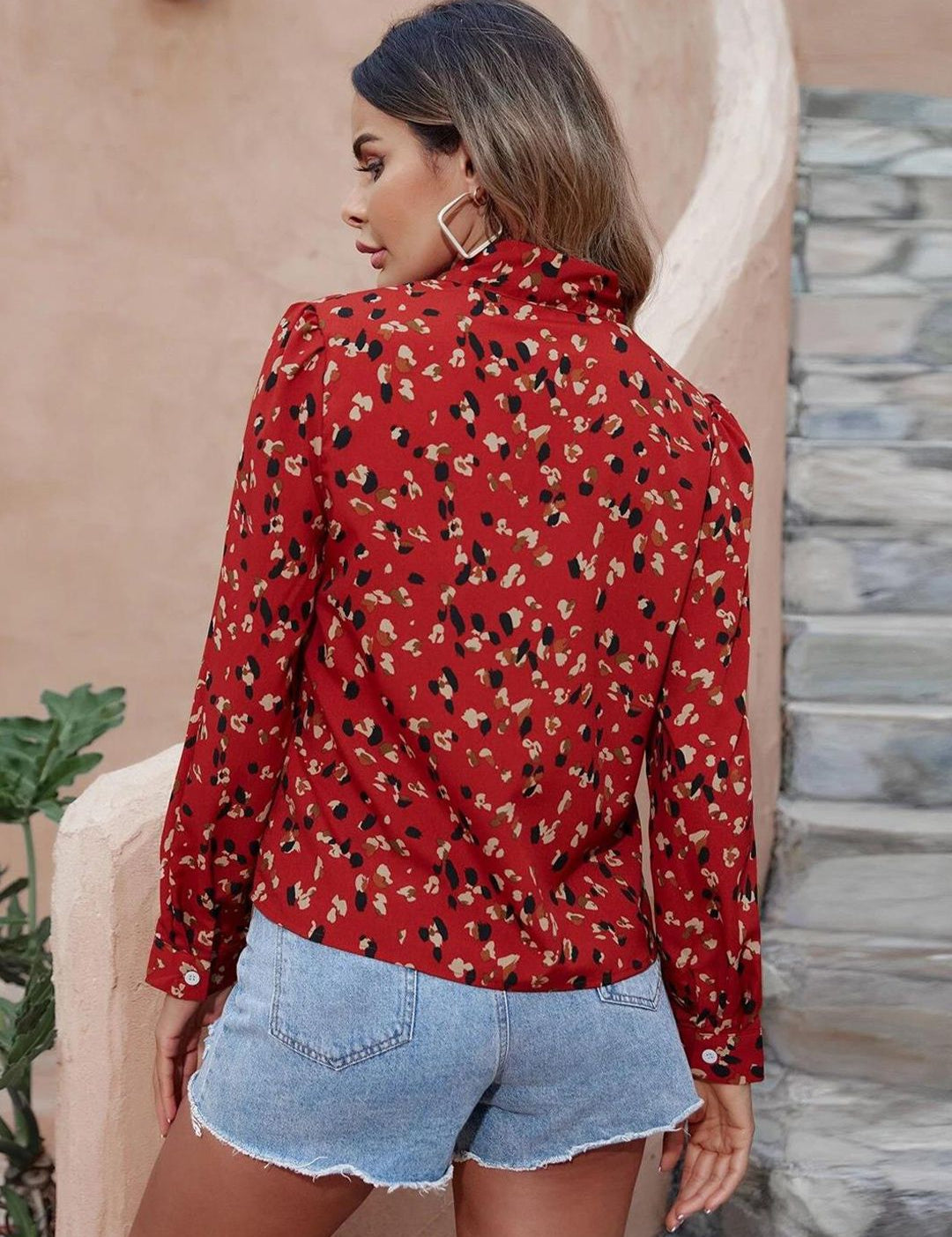 Kotty Red Abstract Printed Tie-Up Neck Regular Top