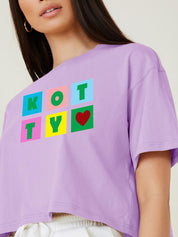 Kotty Purple Printed Round Neck Drop-Shoulder Sleeves Crop Oversized T-shirt