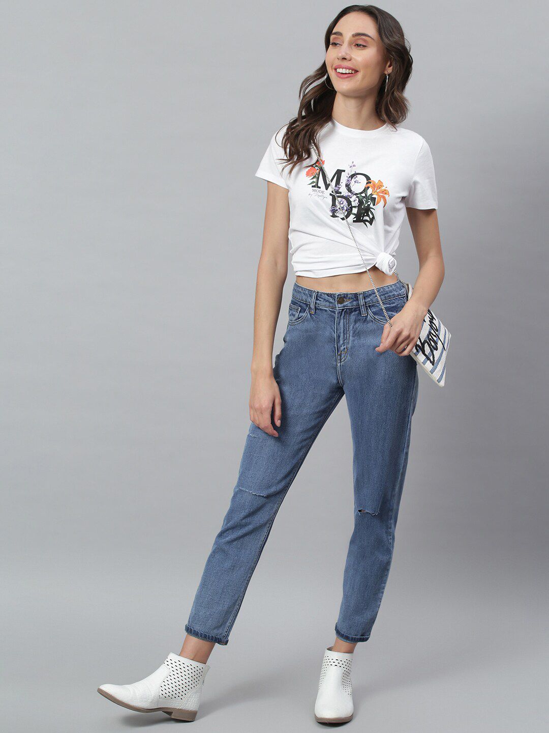 Kotty Women Blue Regular Fit Mid-Rise Low Distress Stretchable Jeans