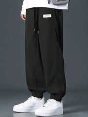 Kotty Men Relaxed High-Rise Corduroy Joggers Trousers