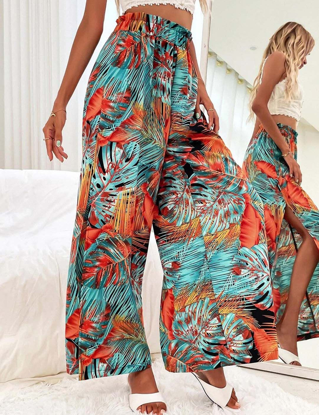 Kotty Women Teal Floral Printed Relaxed Flared High-Rise Easy Wash Pleated Trousers