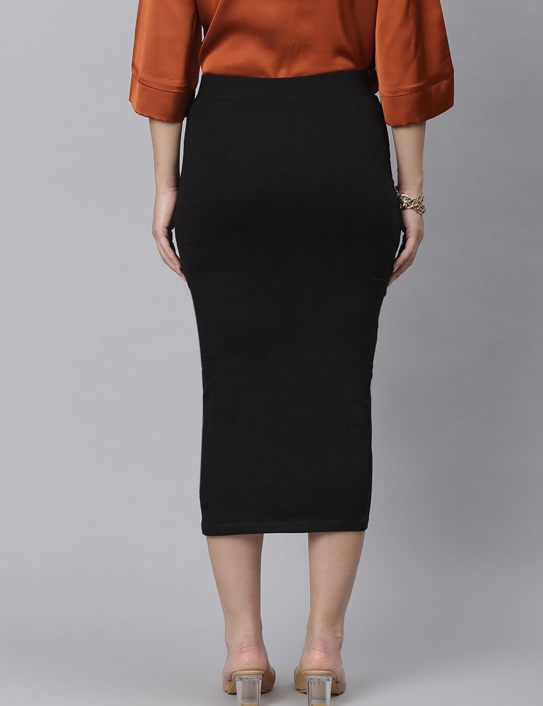 Kotty Women Black Solid Midi Pencil Skirt