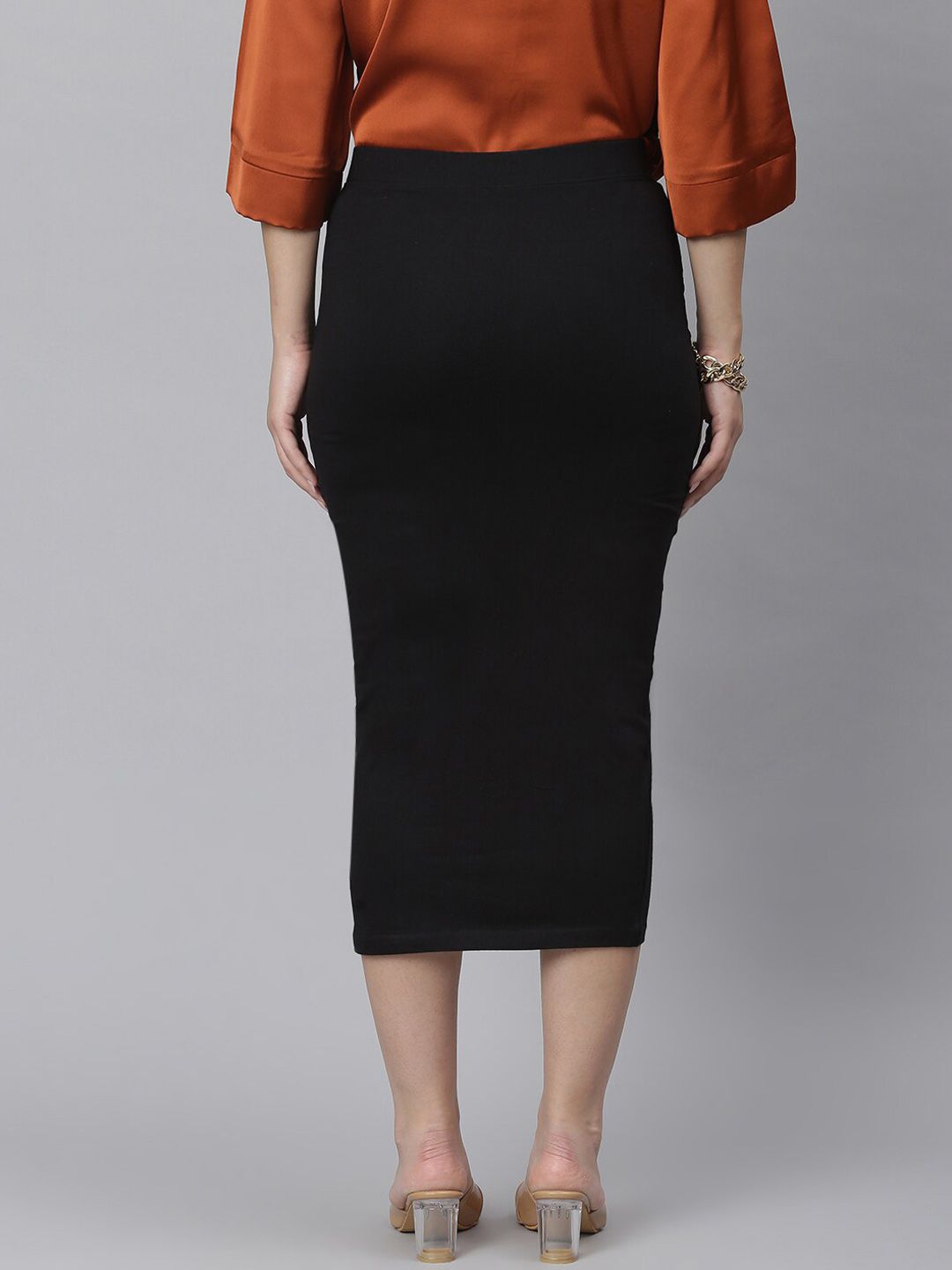 Kotty Women Black Solid Midi Pencil Skirt