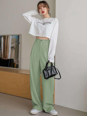 Kotty Women Relaxed Straight Leg Straight Fit High-Rise Easy Wash Pleated Trousers