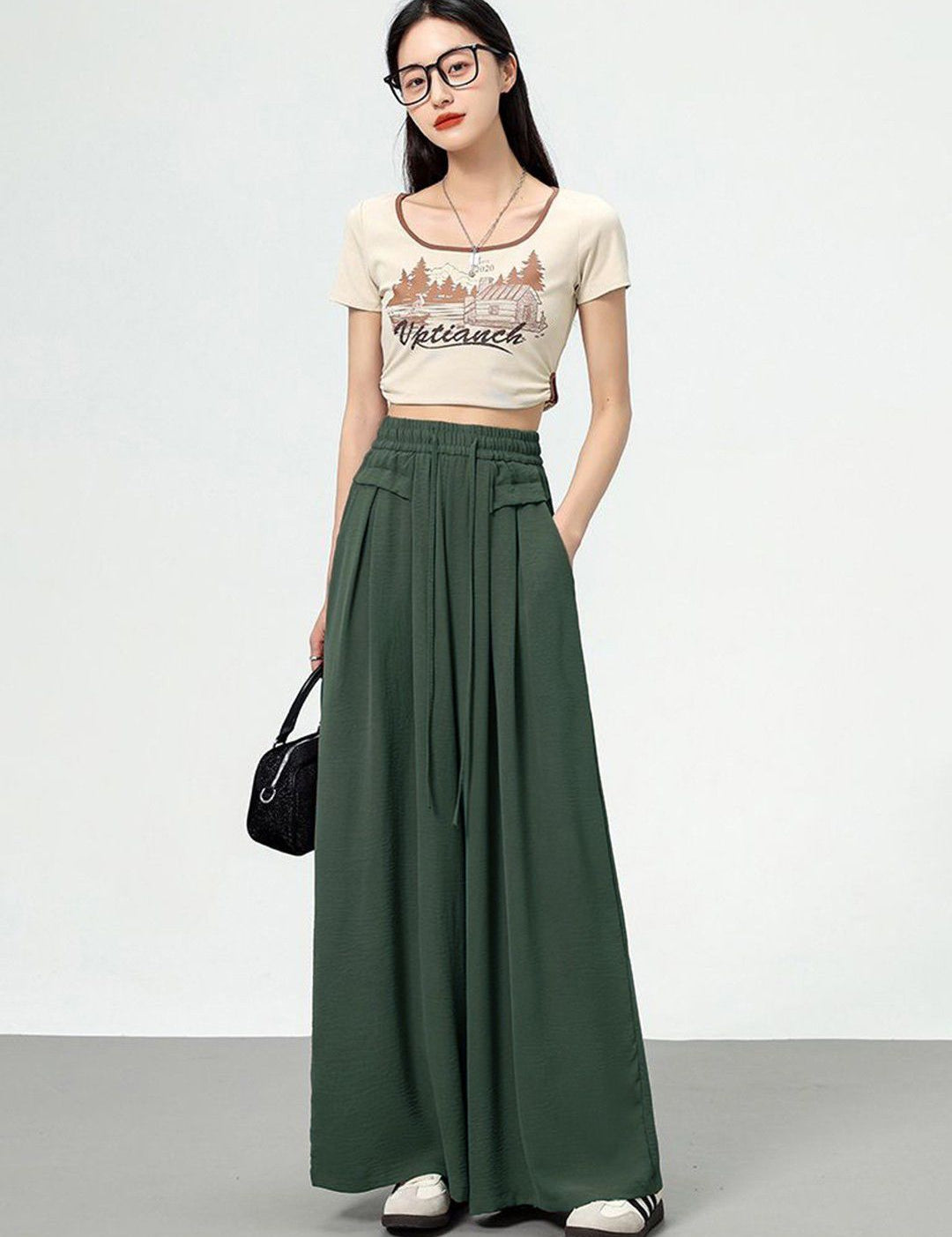 Kotty Women Loose Fit High-Rise Pleated Cotton Trousers