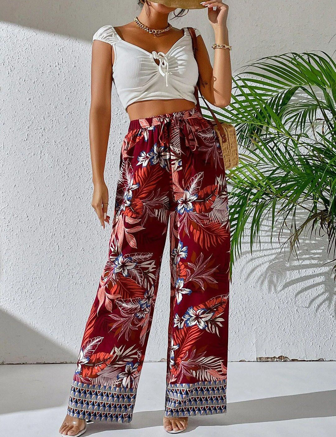 Kotty Women Maroon Floral Printed Relaxed Straight Fit High-Rise Easy Wash Trousers