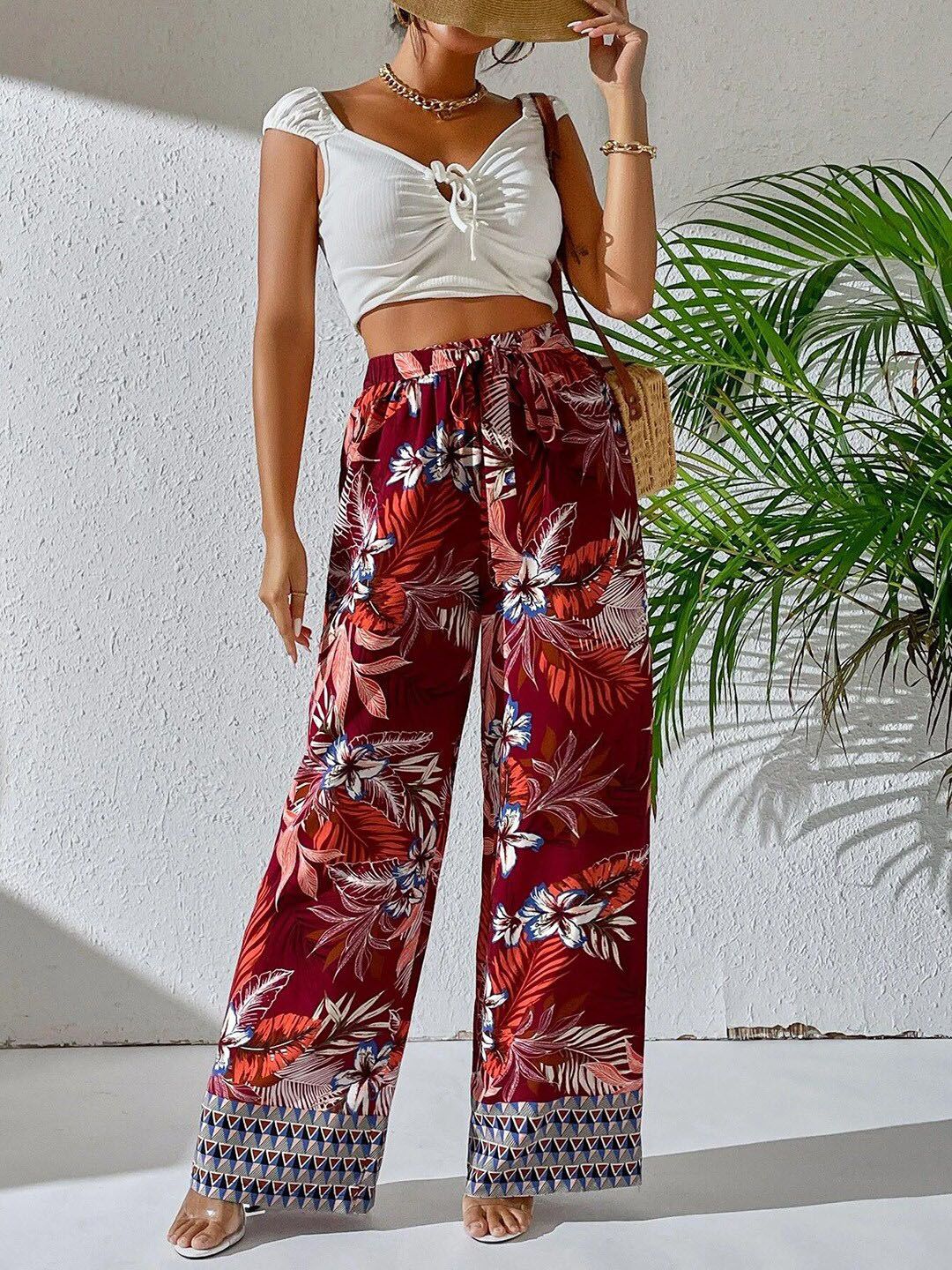 Kotty Women Maroon Floral Printed Relaxed Straight Fit High-Rise Easy Wash Trousers