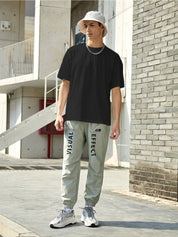 Kotty Black Drop-Shoulder Sleeves Oversized Cotton Casual T-Shirt