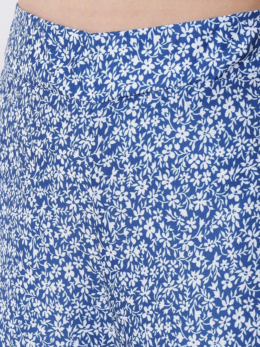 Kotty Women Blue and White Floral Printed Relaxed Flared High-Rise Trousers