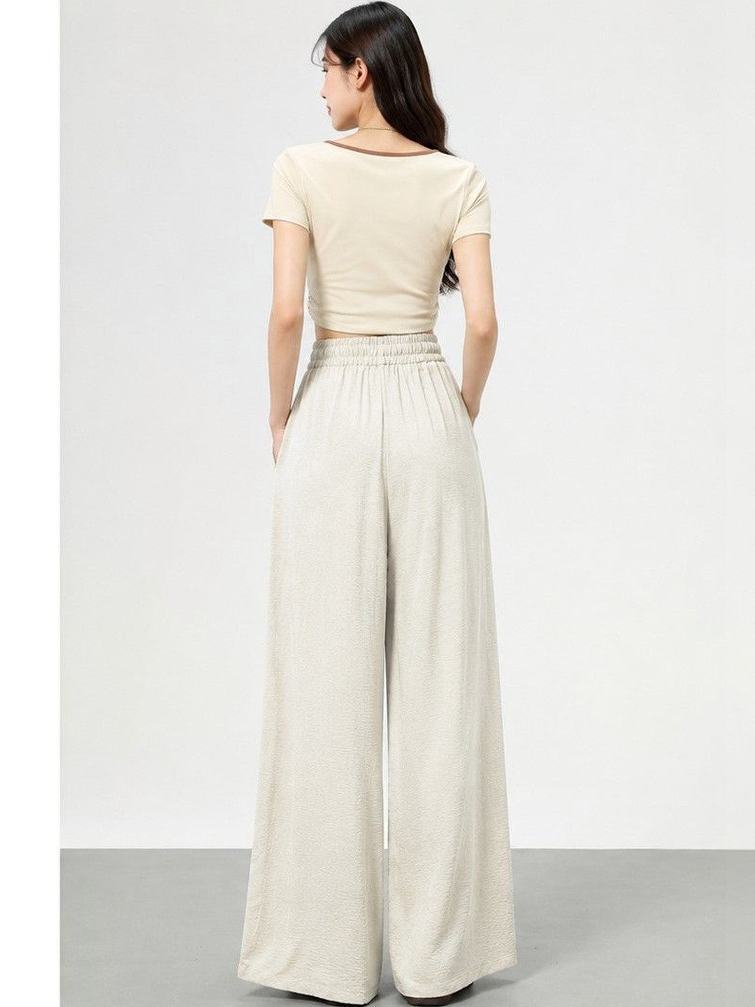 White Flared High-Rise Trousers for Women – Versatile Solid Design | Kotty