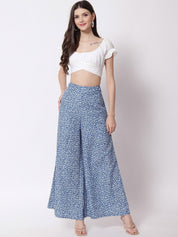 Kotty Women Blue and White Floral Printed Relaxed Flared High-Rise Trousers