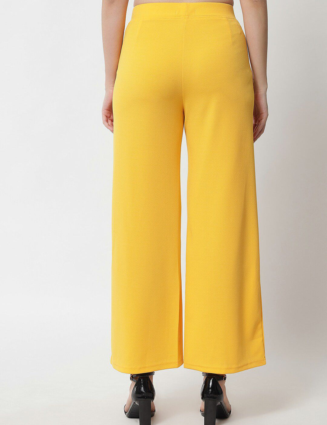 Kotty Women Yellow Solid Relaxed Straight Fit Easy Wash Pleated Trousers