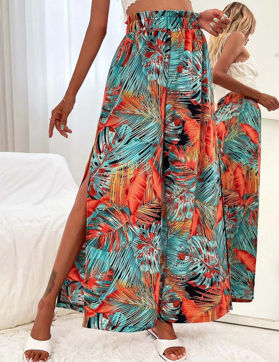 Kotty Women Teal Floral Printed Relaxed Flared High-Rise Easy Wash Pleated Trousers