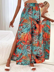 Kotty Women Teal Floral Printed Relaxed Flared High-Rise Easy Wash Pleated Trousers