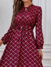 Kotty Maroon Checked Printed Tie-Up Neck Puff Sleeves Fit & Flare Midi Dress