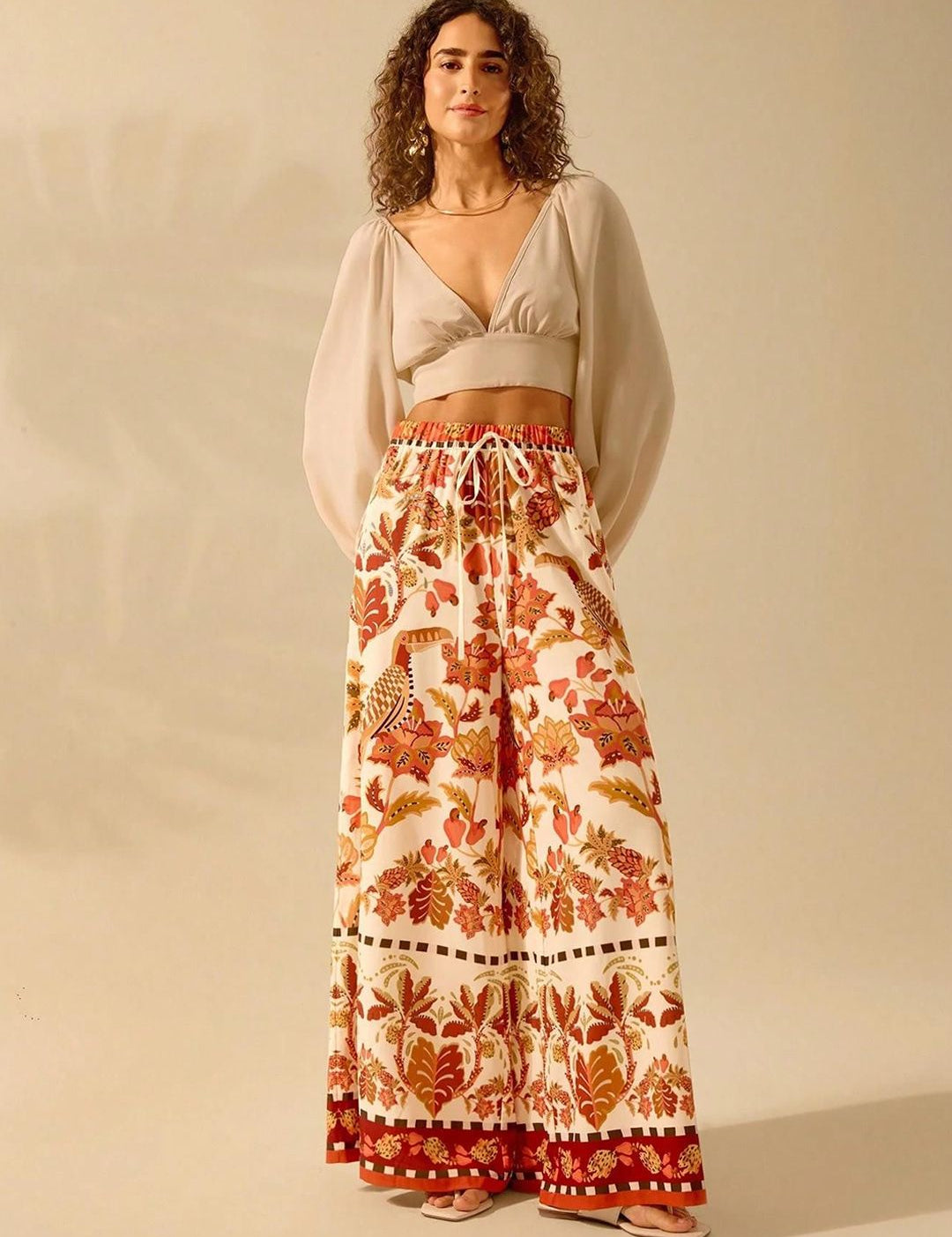 Kotty Women Floral Printed Flared High-Rise Trousers