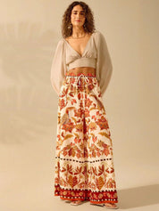 Kotty Women Floral Printed Flared High-Rise Trousers