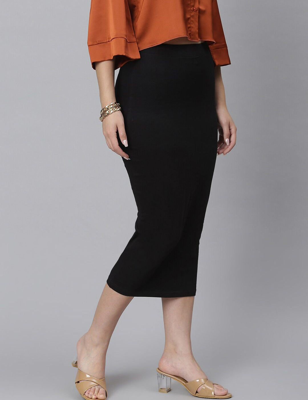 Kotty Women Black Solid Midi Pencil Skirt