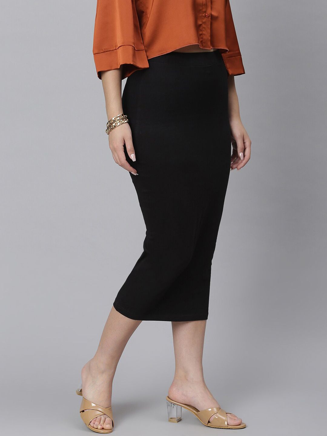 Kotty Women Black Solid Midi Pencil Skirt