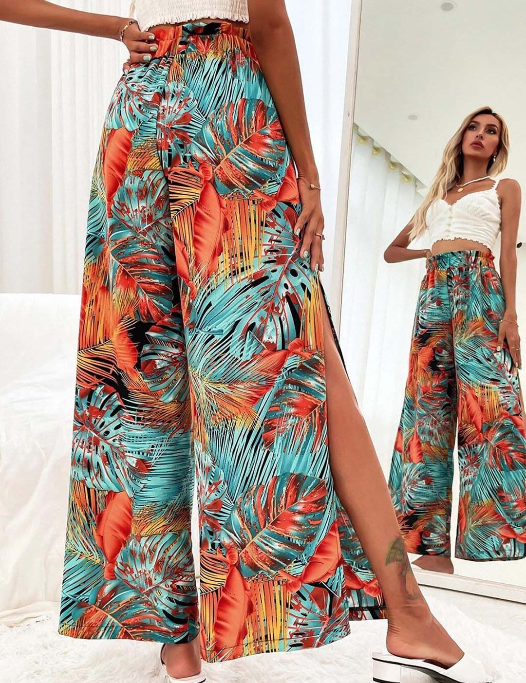 Kotty Women Teal Floral Printed Relaxed Flared High-Rise Easy Wash Pleated Trousers