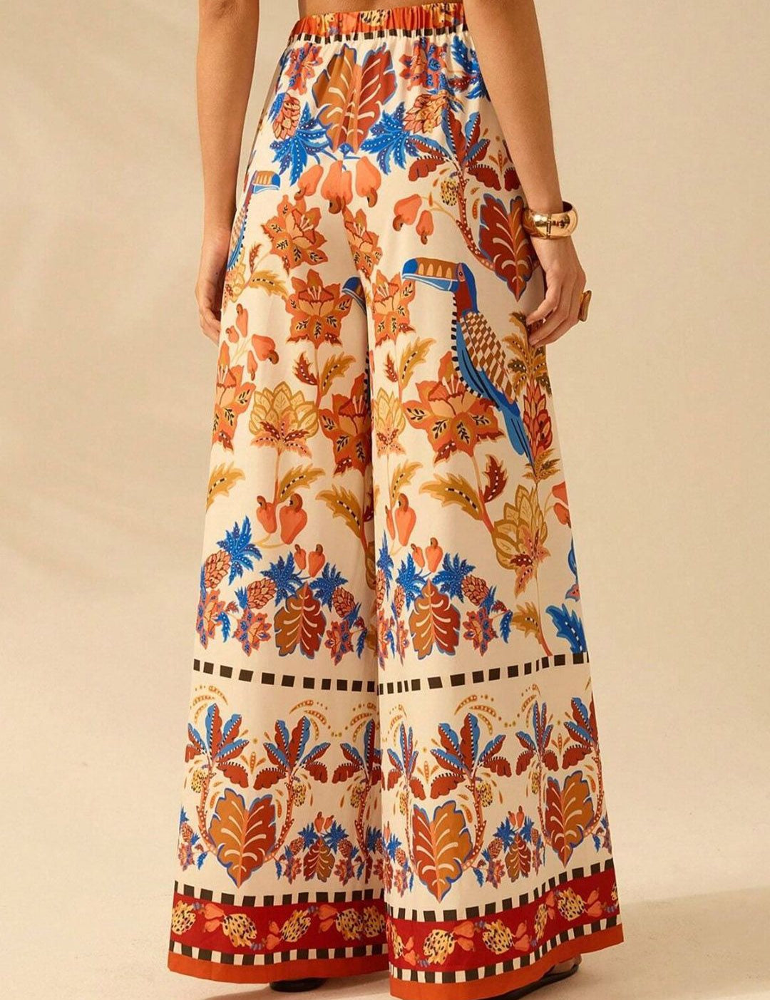 Kotty Women Floral Printed Comfort Flared High-Rise Regular Trousers