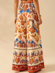 Kotty Women Floral Printed Comfort Flared High-Rise Regular Trousers