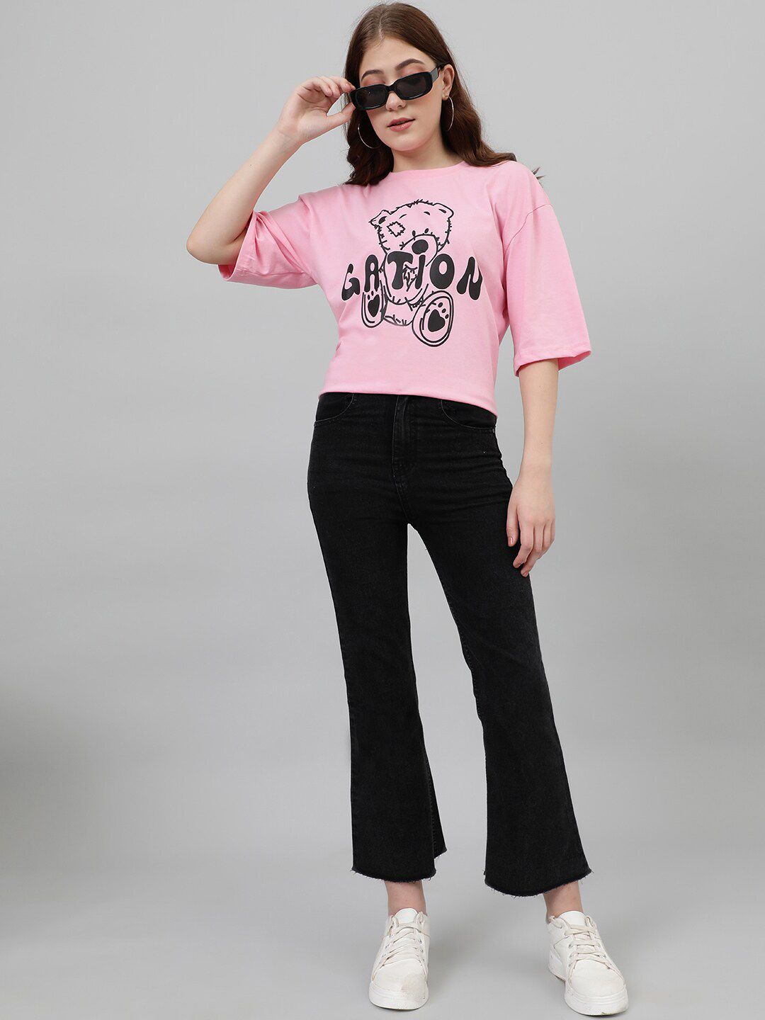 Kotty Graphic Printed Drop-Shoulder Sleeves Oversized Casual T-shirt