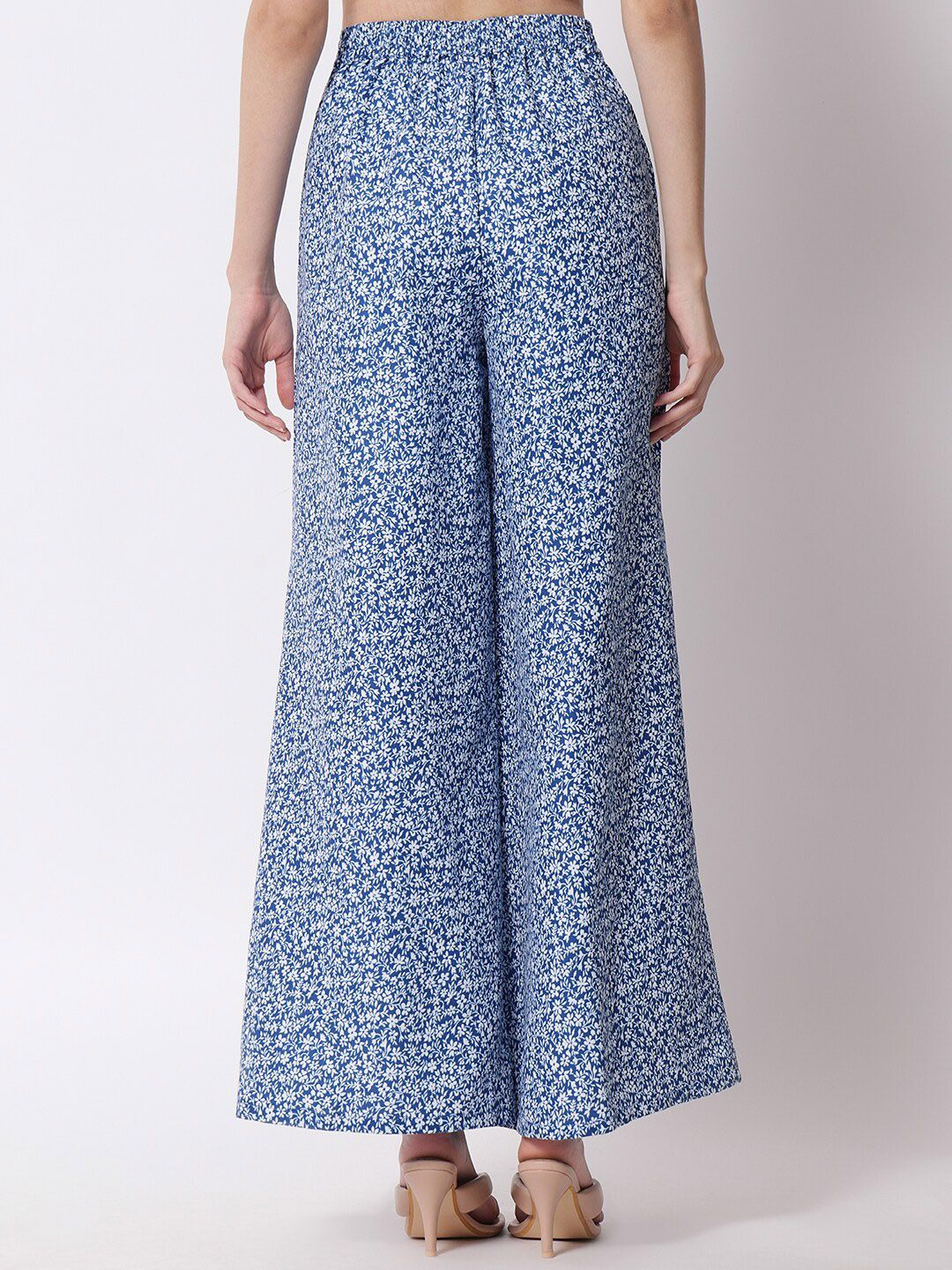 Kotty Women Blue and White Floral Printed Relaxed Flared High-Rise Trousers
