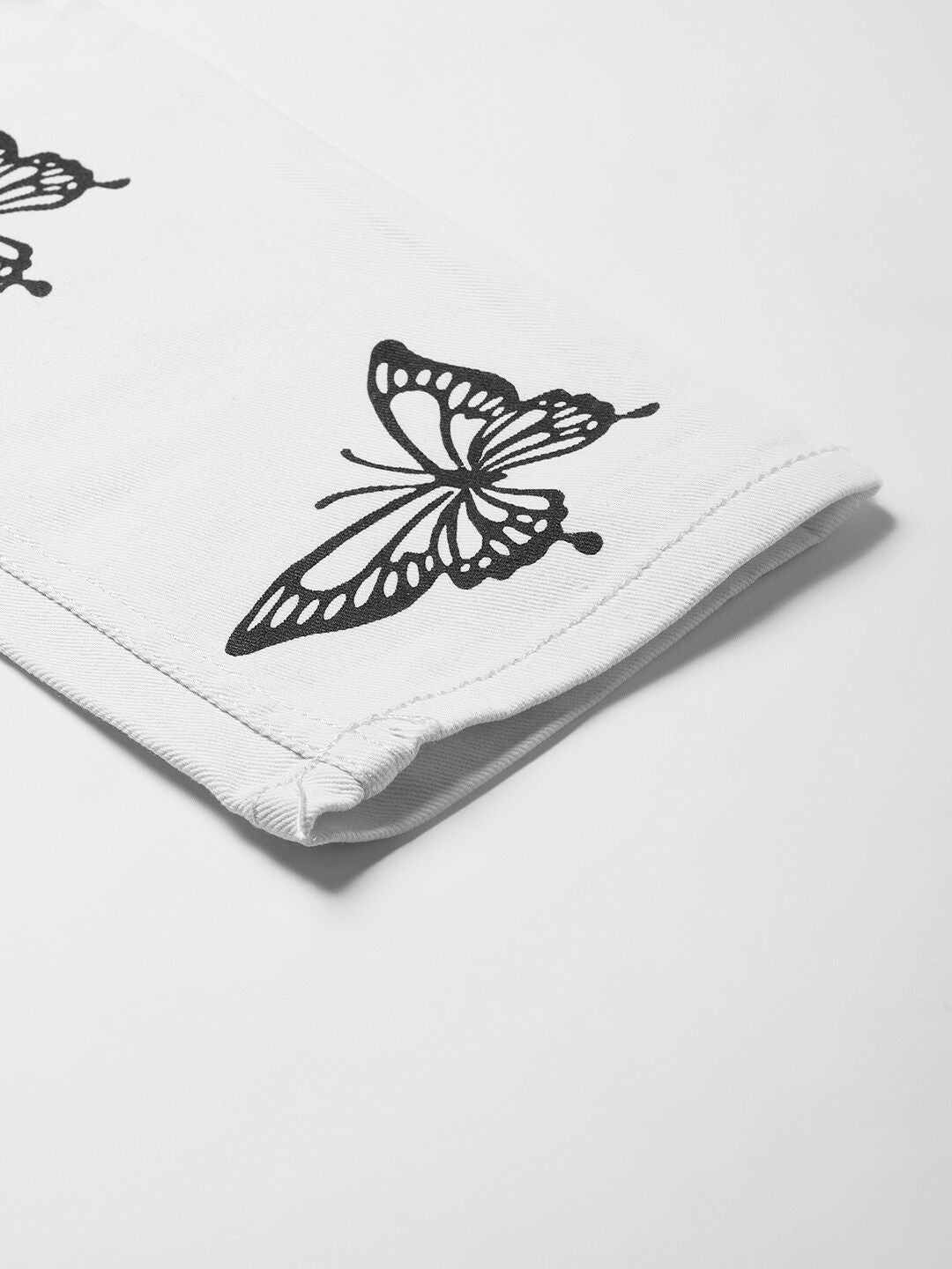 Kotty Women White Regular Fit Mid-Rise Clean Look Printed Stretchable Jeans