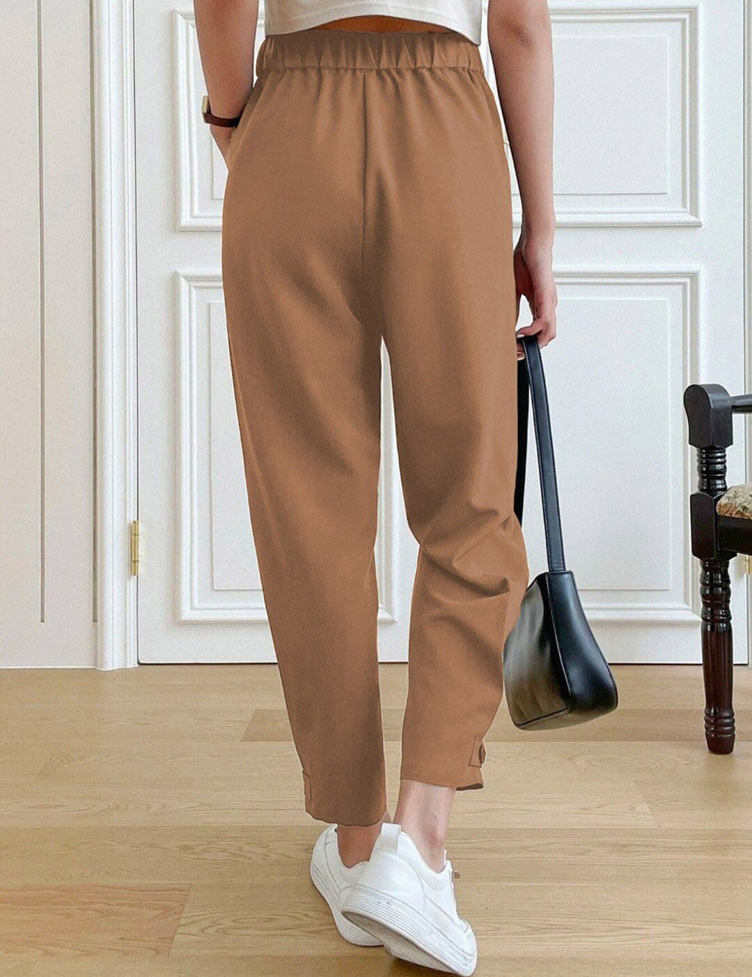 Kotty Women Brown Relaxed Straight Fit High-Rise Easy Wash Pleated Trousers