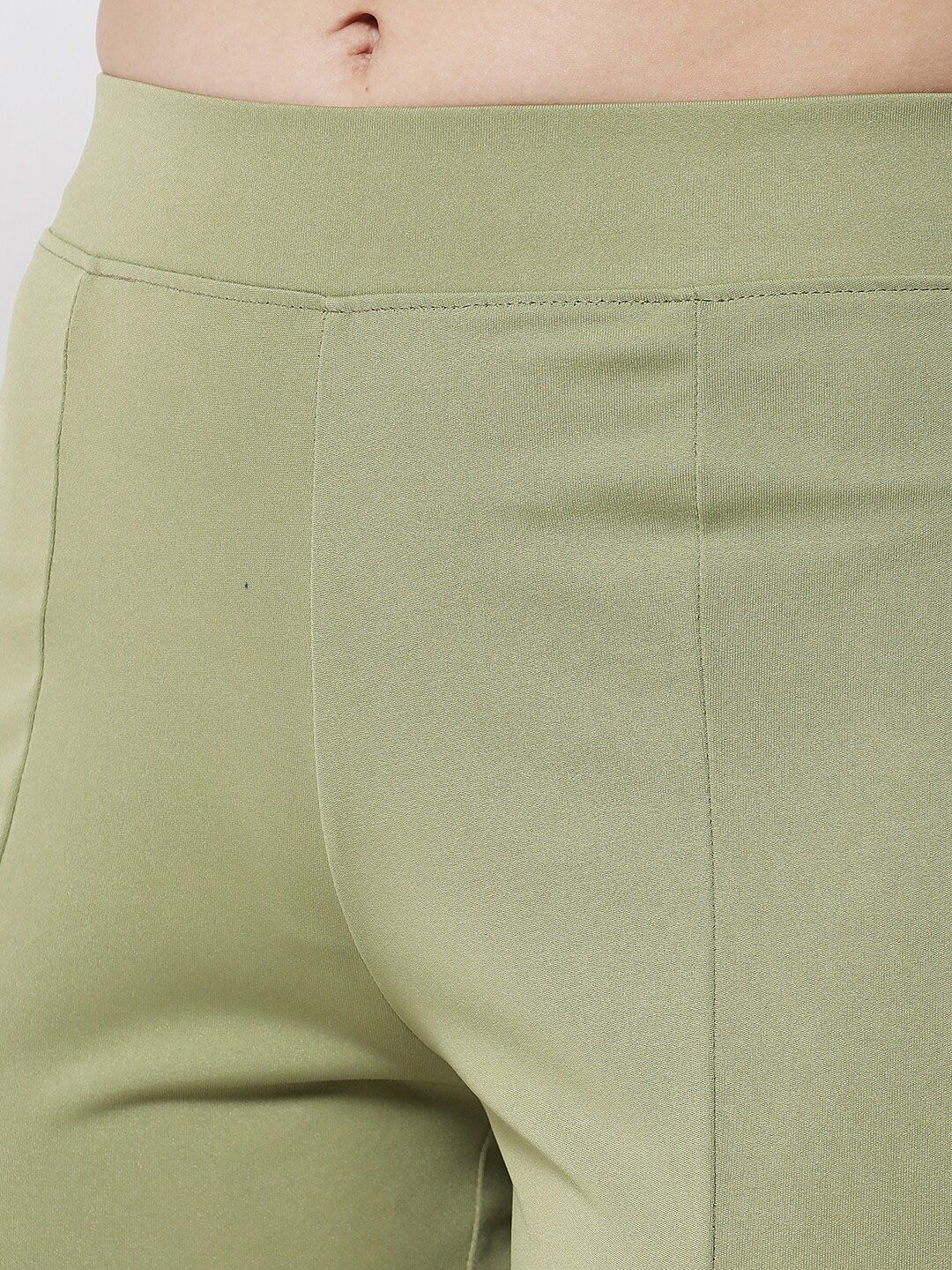 Kotty Women Green Solid Relaxed Fit Bootcut Trousers