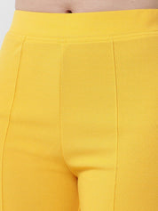 Kotty Women Yellow Solid Relaxed Straight Fit Easy Wash Pleated Trousers