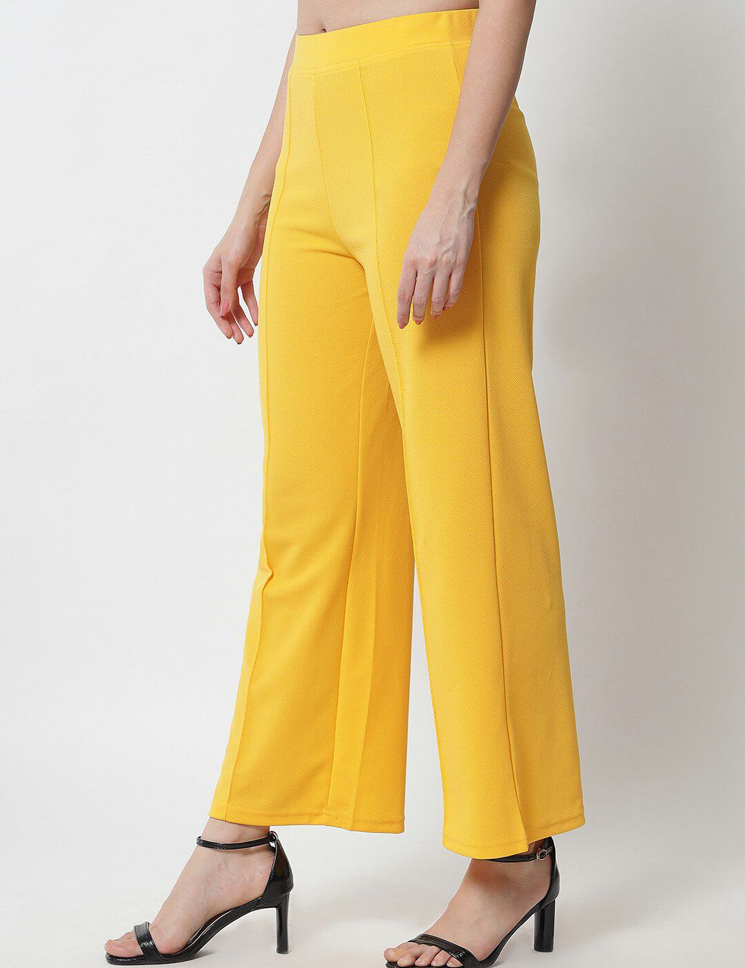 Kotty Women Yellow Solid Relaxed Straight Fit Easy Wash Pleated Trousers