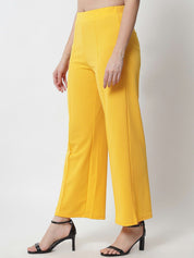 Kotty Women Yellow Solid Relaxed Straight Fit Easy Wash Pleated Trousers