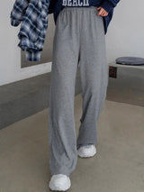 Kotty Women Straight Fit Mid-Rise Track Pants