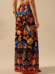 Kotty Women Floral Printed Relaxed Flared High-Rise Trousers