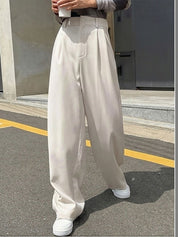White Relaxed Fit High-Rise Trousers for Women | Kotty