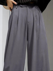 Kotty Women Relaxed Straight Leg Straight Fit High-Rise Easy Wash Pleated Trousers
