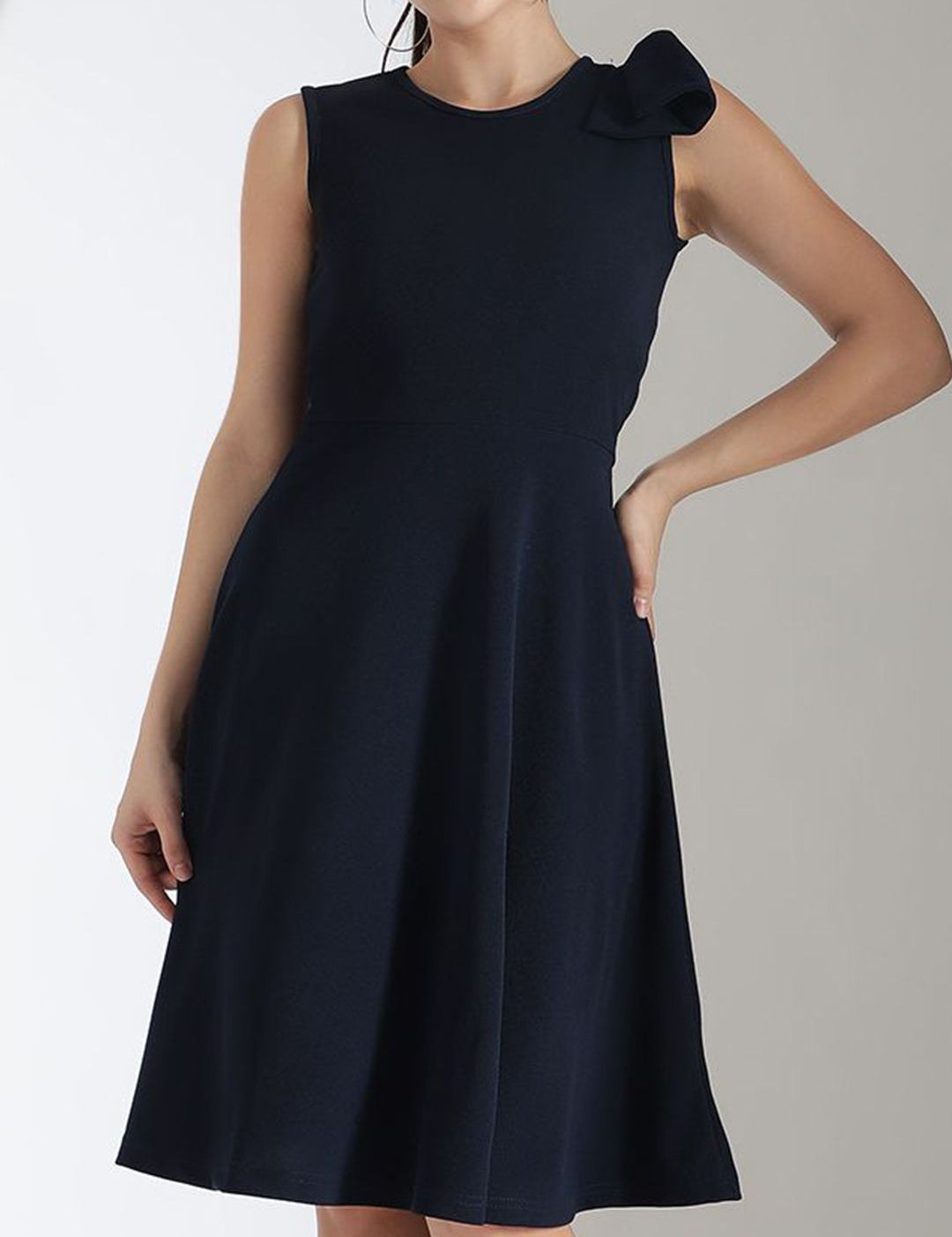 Kotty Solid Round Neck Bow Detailed Fit & Flare Dress