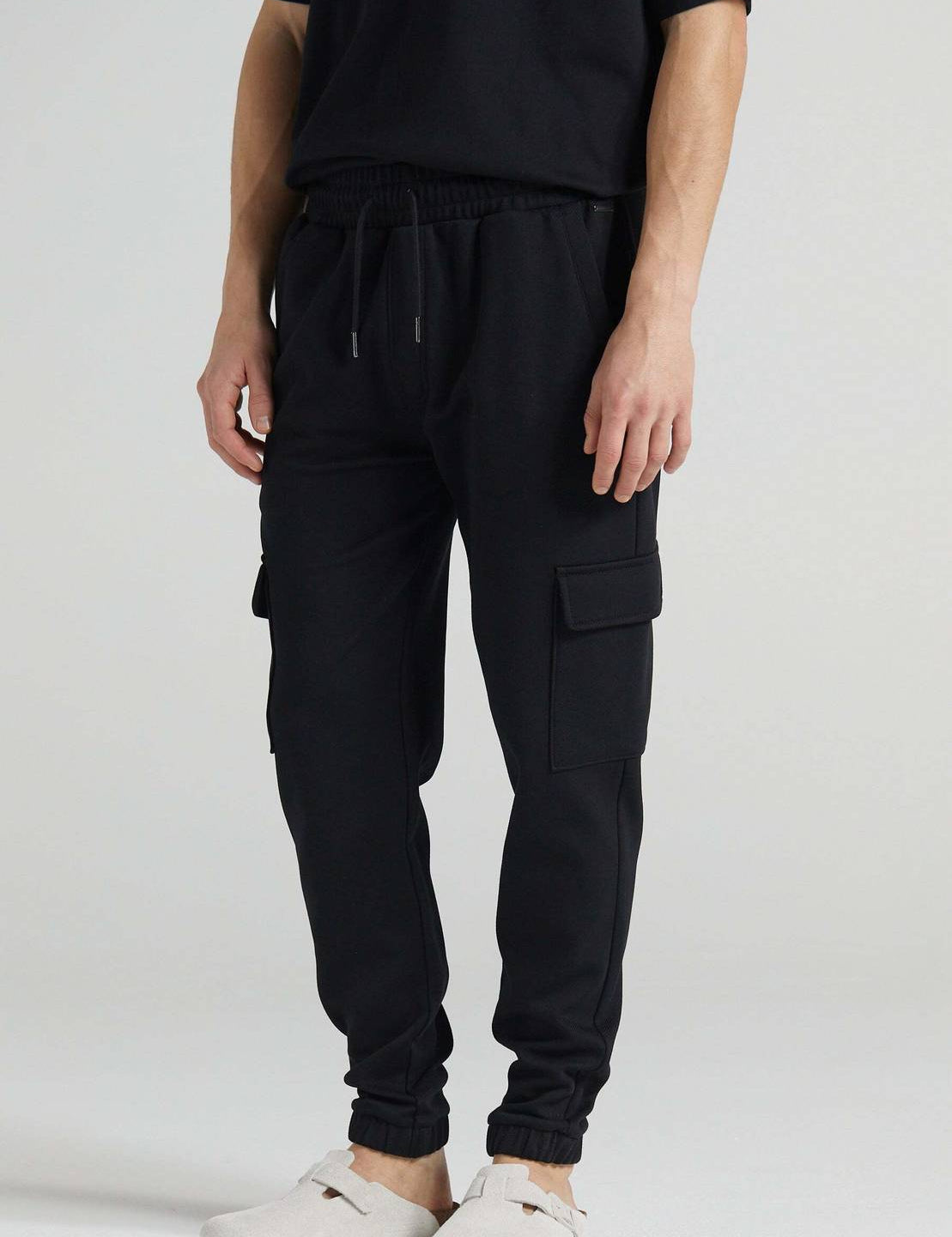 MenSolidBlackTrackPants-0.jpg_1_deea1cb2-d552-4b8a-99b7-eb42ec89772e.jpg