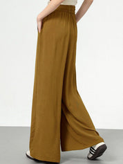 Kotty Women Loose Fit High-Rise Solid Breathable Easy Wash Pleated Crumble Trousers