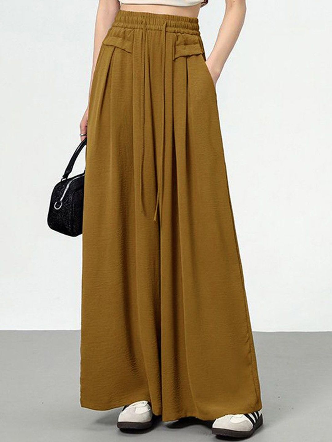 Kotty Women Loose Fit High-Rise Solid Breathable Easy Wash Pleated Crumble Trousers