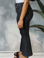 Kotty Women Bootcut High Rise Mildly Distressed Light Fade Stretchable Jeans