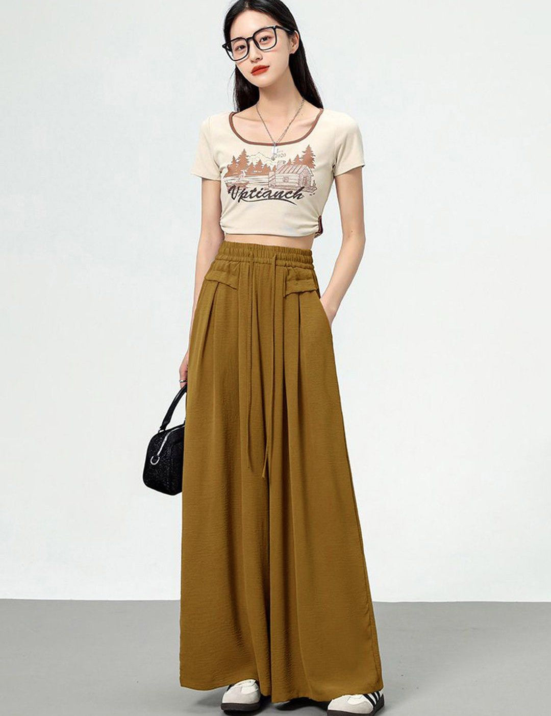 Kotty Women Loose Fit High-Rise Solid Breathable Easy Wash Pleated Crumble Trousers