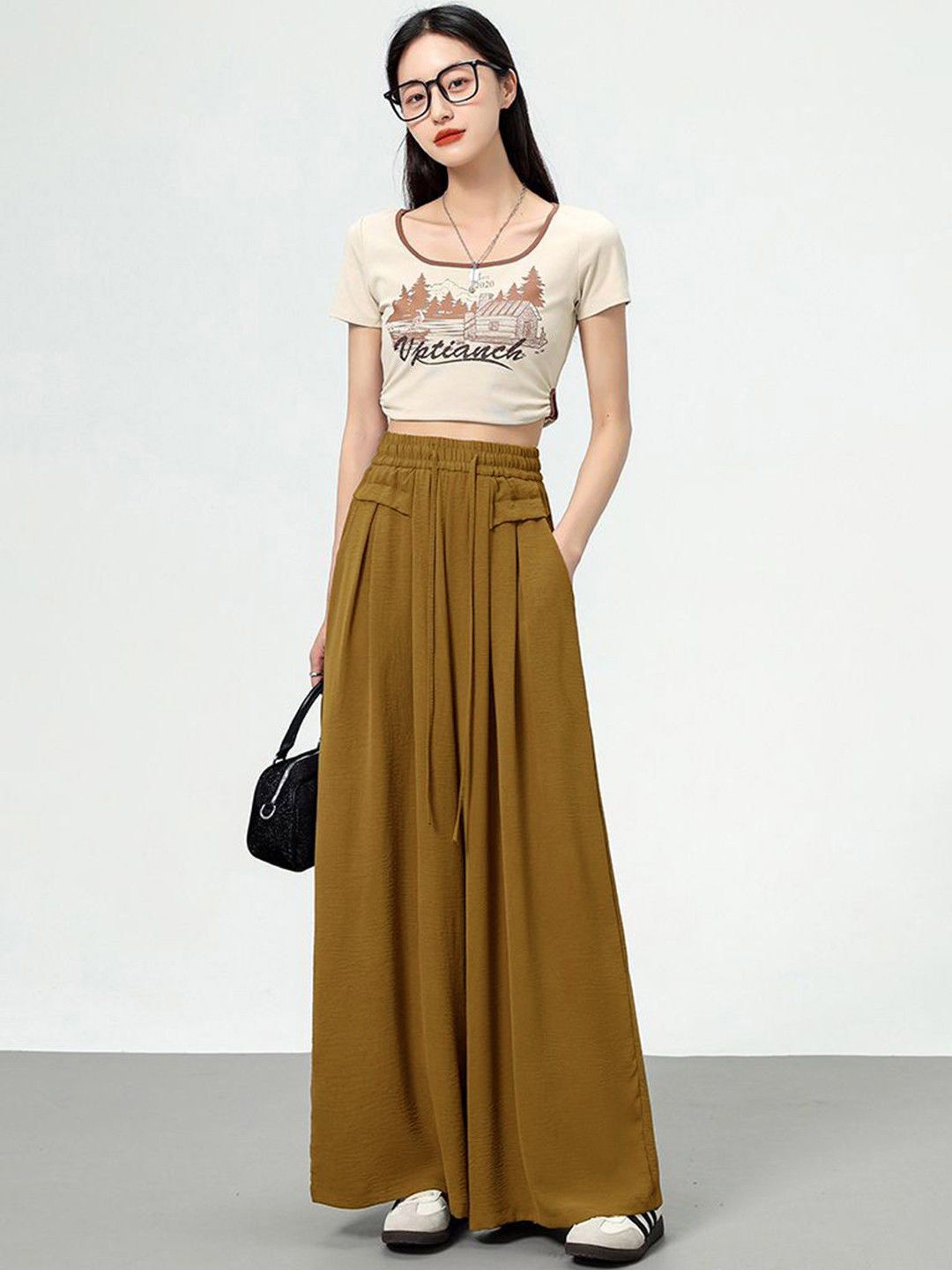 Kotty Women Loose Fit High-Rise Solid Breathable Easy Wash Pleated Crumble Trousers