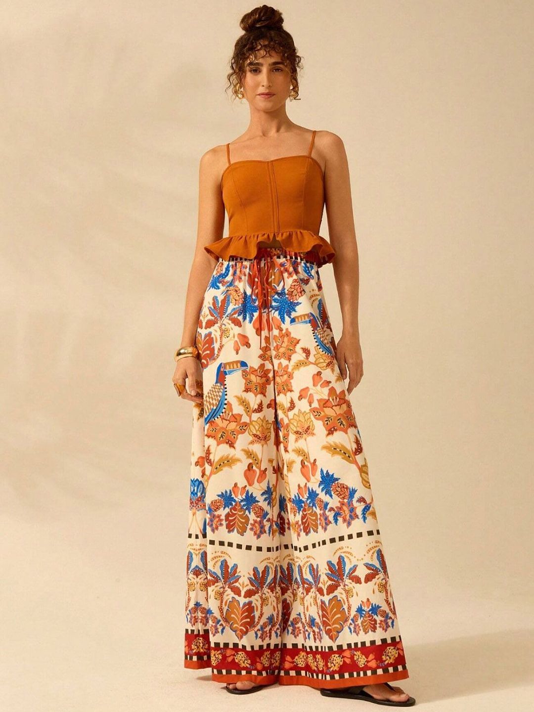 Kotty Women Floral Printed Comfort Flared High-Rise Regular Trousers