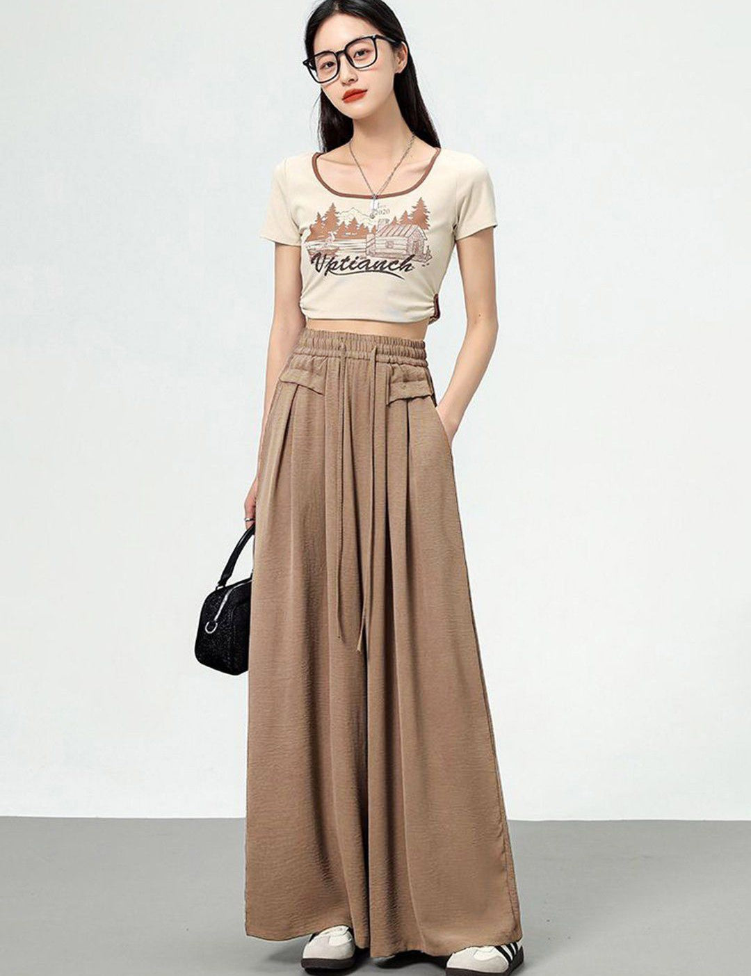 Kotty Women Textured Flared High-Rise Trouser